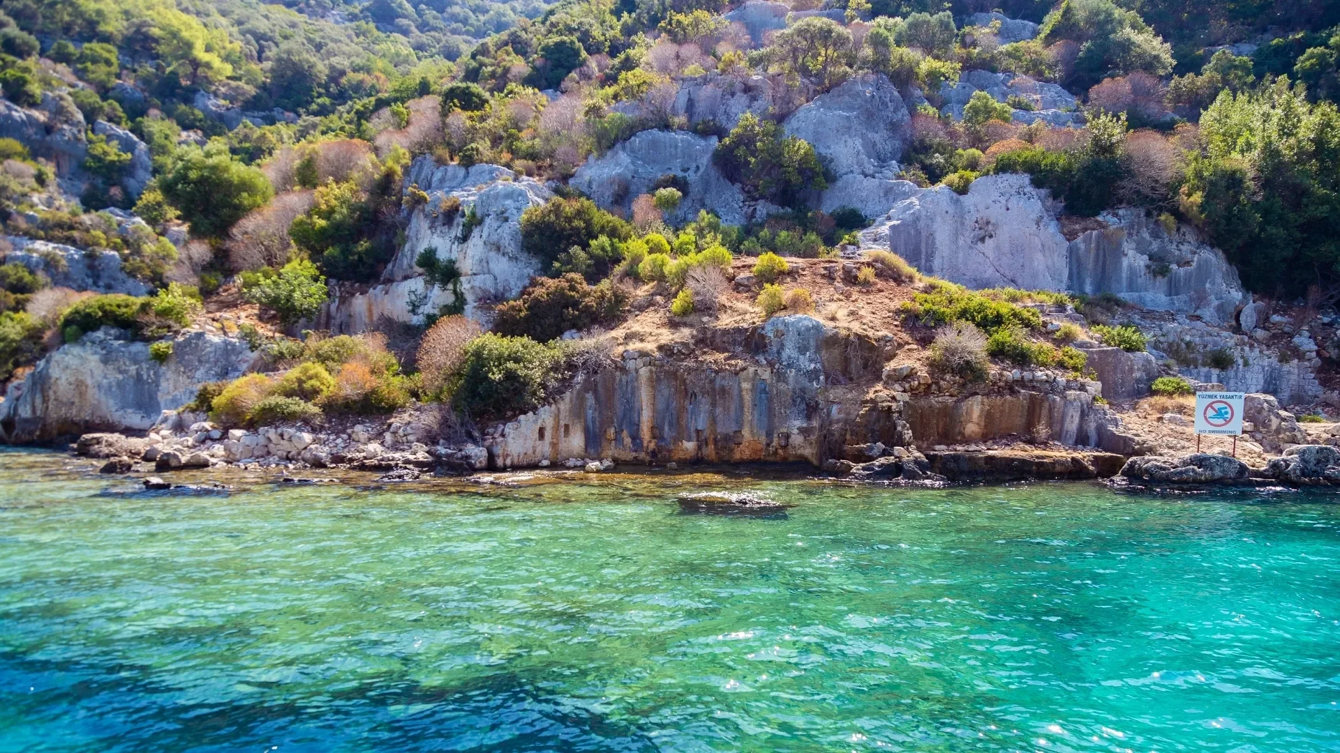 Cruise along the historic shores of Kekova and admire ancient Lycian ruins beside the turquoise sea.