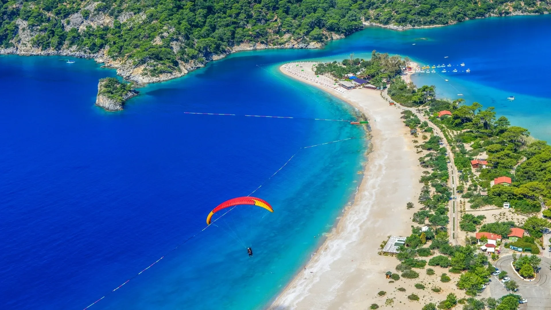 Experience the iconic blue waters of Ölüdeniz, a picture-perfect finale to your gulet cruise toward Fethiye.