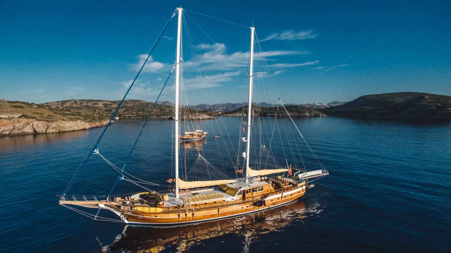 Sail the Turquoise Coast aboard a traditional Turkish gulet, surrounded by secluded bays and crystal-clear waters.