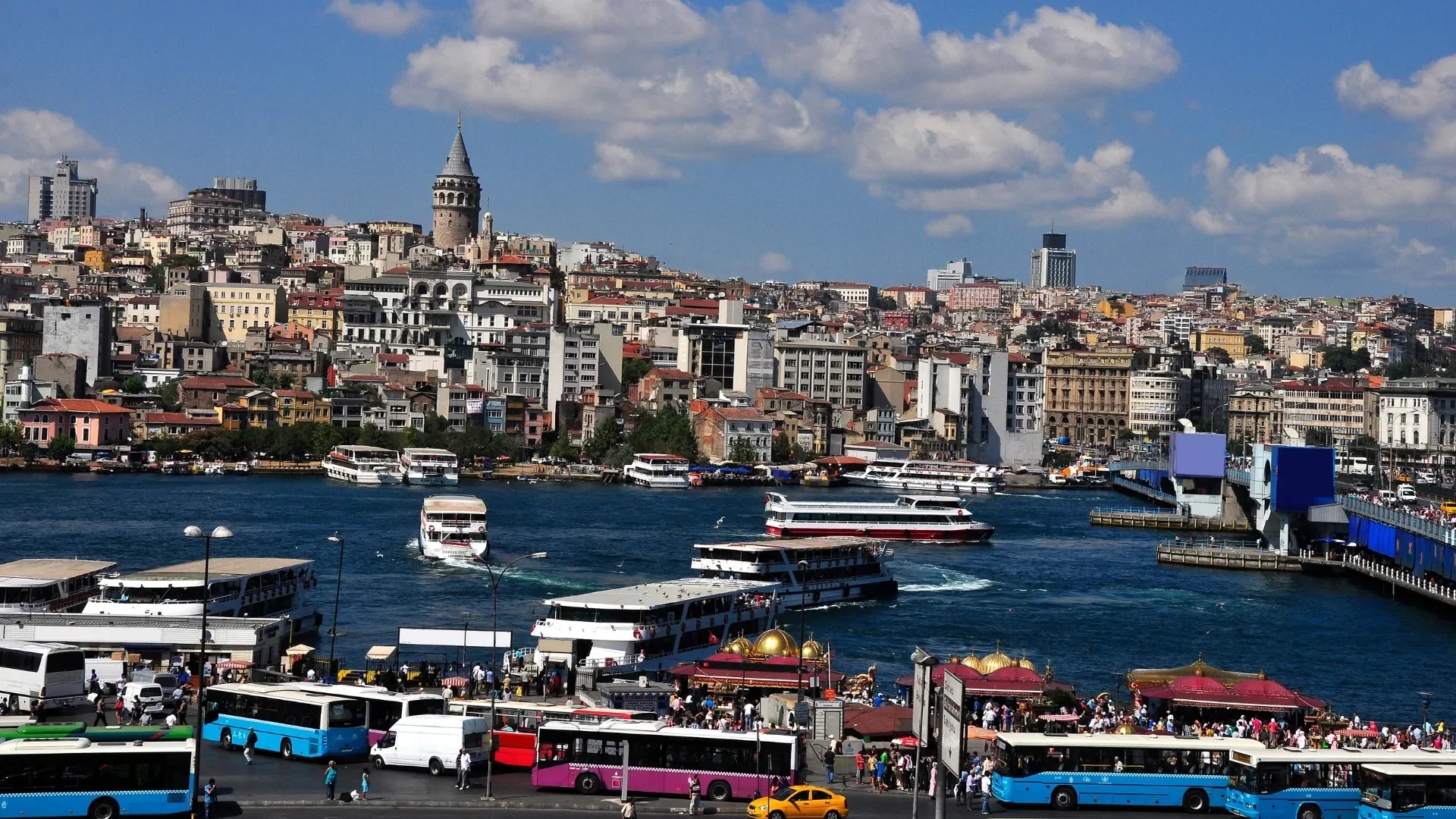 A scenic view of Istanbul’s historic skyline, Galata Tower and the Bosphorus from Eminonu Square, capturing the city’s unique blend of Europe and Asia.
