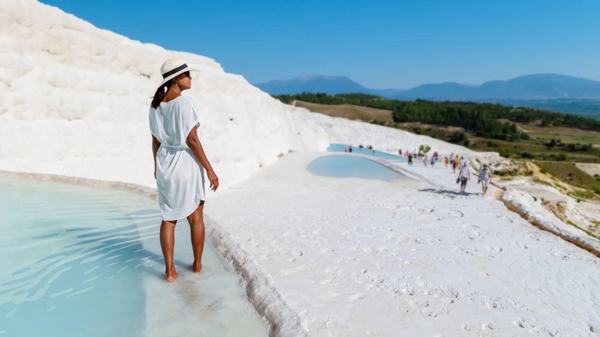 Cruise Passenger Walking on White Terraces of Pamukkale