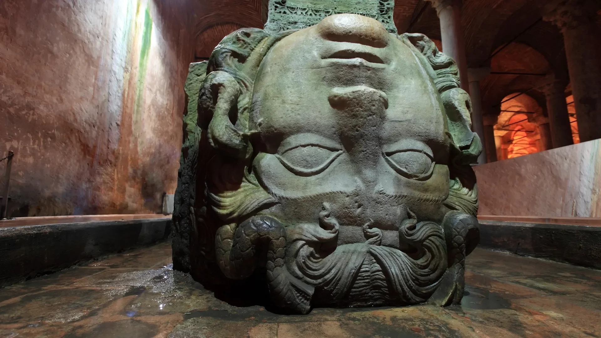 Medusa head column base at Basilica Cistern: Learn the story behind the upside-down Medusa head inside the Basilica Cistern, a mysterious detail from Byzantine Istanbul.